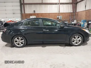 2012 Hyundai Sonata SE z VIN 5NPEC4AC9CH355351, wystawiony jako IAAI lot #42318588 z przebiegiem 122 864 mil mil oraz . Historia ofert i sprzedaży dostępna na DreamBid. Obrazek 13.