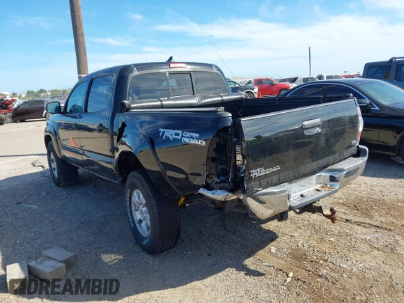 2015 Toyota Tacoma with VIN 3TMLU4EN2FM169326, listed as a IAAI auction lot 40689500 with 77,003 mi miles and . Bid and sale history available at DreamBid. Image 3.