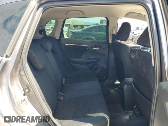 2015 Honda Fit LX z VIN 3HGGK5G52FM719166, wystawiony jako Copart lot #61162425 z przebiegiem 172 075 mil mil oraz Czysty tytuł • Clean title. Historia ofert i sprzedaży dostępna na DreamBid. Obrazek 10.