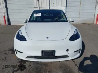 2023 Tesla Model Y Performance with VIN 7SAYGDEF3PF711497, listed as a IAAI auction lot 41877450 with 21,887 mi miles and . Bid and sale history available at DreamBid. Image 12.