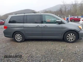 2009 Honda Odyssey EX-L with VIN 5FNRL38709B413309, listed as a IAAI auction lot 41923350 with 252,482 mi miles. Bid and sale history available at carsss.com. Image 14.