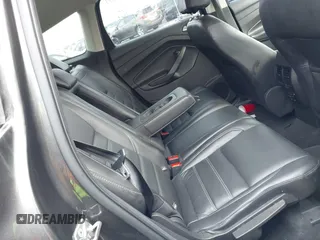 2017 Ford Escape Titanium z VIN 1FMCU0JD9HUE03672, wystawiony jako IAAI lot #42411549 z przebiegiem 89 846 mil mil oraz . Historia ofert i sprzedaży dostępna na DreamBid. Obrazek 8.
