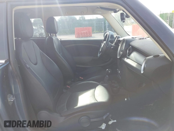 2011 MINI Hardtop with VIN WMWSU3C54BTX95896, listed as a IAAI auction lot 42467612 with 106,202 mi miles and . Bid and sale history available at DreamBid. Image 5.