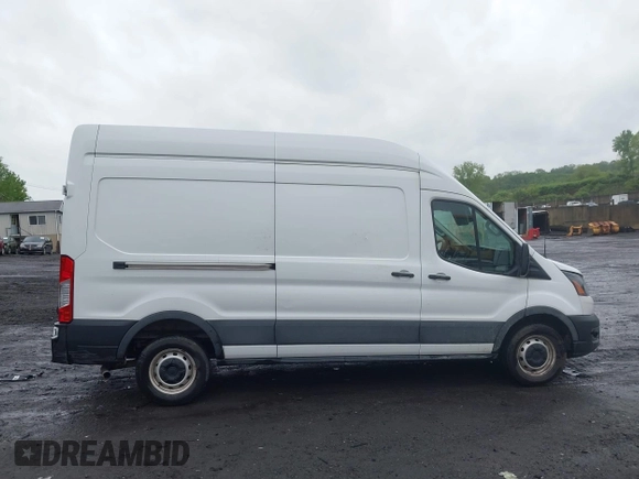 2021 Ford Transit Cargo with VIN 1FTBW1X84MKA98047, listed as a IAAI auction lot 42313747 with 65,600 mi miles and . Bid and sale history available at DreamBid. Image 13.