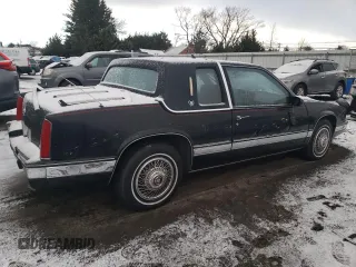 1988 Cadillac Eldorado with VIN 1G6EL1155JU622216, listed as a Copart auction lot 83659204 with 44,668 mi miles and Salvage Title. Bid and sale history available at DreamBid. Image 3.
