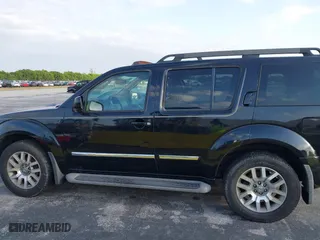 2012 Nissan Pathfinder LE with VIN 5N1AR1NN5CC607403, listed as a IAAI auction lot 41813677 with 217,854 mi miles. Bid and sale history available at carsss.com. Image 14.