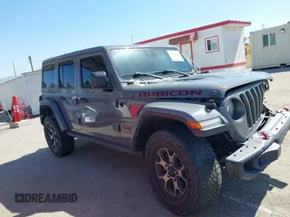 2019 Jeep Wrangler Unlimited Rubicon with VIN 1C4HJXFN6KW547401, listed as a IAAI auction lot 42250698 with 103,910 mi miles and . Bid and sale history available at DreamBid. Image 13.
