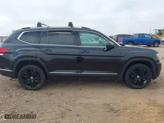 2019 Volkswagen Atlas 3.6L V6 SEL Premium with VIN 1V2NR2CAXKC550320, listed as a IAAI auction lot 41583068 with 104,378 mi miles. Bid and sale history available at carsss.com. Image 13.