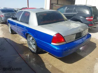 1999 Ford Crown Victoria Police Pkg with VIN 2FAFP71W5XX192230, listed as a IAAI auction lot 41629743 with 170,510 mi miles. Bid and sale history available at carsss.com. Image 3.