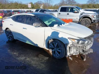 2018 Nissan Maxima S with VIN 1N4AA6APXJC395939, listed as a IAAI auction lot 41635836 with 108,587 mi miles and . Bid and sale history available at DreamBid. Image 13.