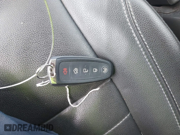 2014 Ford Escape Titanium with VIN 1FMCU0JX7EUA28824, listed as a IAAI auction lot 42065325 with 107,761 mi miles. Bid and sale history available at carsss.com. Image 11.
