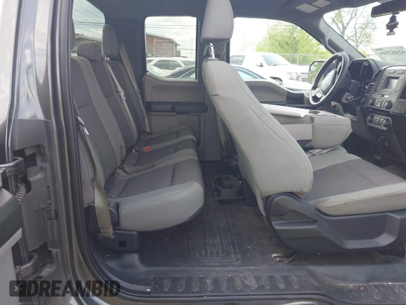 2015 Ford F-150 XLT with VIN 1FTEX1E89FKD84587, listed as a IAAI auction lot 42102545 with 141,265 mi miles. Bid and sale history available at carsss.com. Image 8.