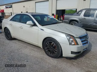 2009 Cadillac CTS RWD z VIN 1G6DF577690108865, wystawiony jako IAAI lot #42314121 z przebiegiem 153 702 mil mil oraz . Historia ofert i sprzedaży dostępna na DreamBid. Obrazek 1.