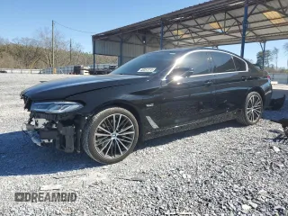 2023 BMW 5 Series 530e with VIN WBA13AG04PCL87228, listed as a Copart auction lot 48057315 with 50,087 mi miles and Salvage title. Bid and sale history available at DreamBid. Image 1.