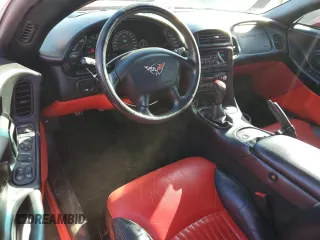 2003 Chevrolet Corvette Z06 with VIN 1G1YY12S635130087, listed as a Copart auction lot 83036504 with 80,712 mi miles and Salvage Title. Bid and sale history available at carsss.com. Image 8.