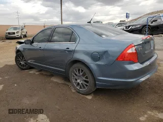 2012 Ford Fusion SE with VIN 3FAHP0HA2CR124891, listed as a Copart auction lot 76113714 with 184,628 mi miles and Salvage title. Bid and sale history available at DreamBid. Image 2.