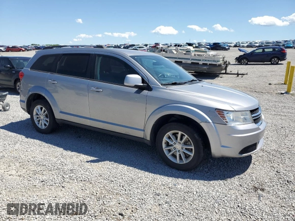 2017 Dodge Journey SXT with VIN 3C4PDDBG3HT591993, listed as a Copart auction lot 58241065 with 161,964 mi miles and Salvage title. Bid and sale history available at DreamBid. Image 4.