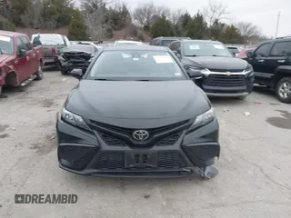 2023 Toyota Camry SE with VIN 4T1G11AK7PU123665, listed as a IAAI auction lot 41142628 with 67,294 mi miles and . Bid and sale history available at DreamBid. Image 12.