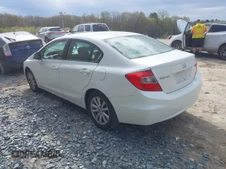 2012 Honda Civic EX with VIN 2HGFB2F81CH607670, listed as a IAAI auction lot 42128341 with 104,090 mi miles and . Bid and sale history available at DreamBid. Image 3.