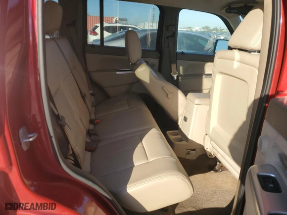 2009 Jeep Liberty Limited with VIN 1J8GN58K79W549037, listed as a Copart auction lot 87963395 with 142,112 mi miles and Clean Title. Bid and sale history available at carsss.com. Image 10.