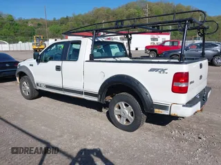 2005 Ford F-150 STX with VIN 1FTRX14W95FB53021, listed as a IAAI auction lot 42138458 with 150,885 mi miles. Bid and sale history available at carsss.com. Image 3.