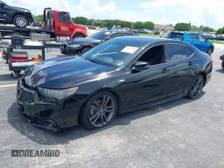 2018 Acura TLX w/A-SPEC Pkg z VIN 19UUB2F65JA002553, wystawiony jako IAAI lot #40023121 z przebiegiem 123 259 mil mil oraz . Historia ofert i sprzedaży dostępna na DreamBid. Obrazek 2.