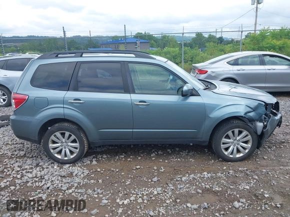 2012 Subaru Forester X Premium with VIN JF2SHADC4CH434795, listed as a IAAI auction lot 42669666 with 107,015 mi miles and . Bid and sale history available at DreamBid. Image 14.