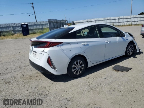 2021 Toyota Prius LE z VIN JTDKAMFP7M3191079, wystawiony jako Copart lot #57529195 z przebiegiem 52 809 mil mil oraz Szkoda całkowita • Salvage title. Historia ofert i sprzedaży dostępna na DreamBid. Obrazek 3.