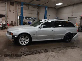 2003 BMW 5 Series 525iT with VIN WBADS33413GD50535, listed as a IAAI auction lot 41405870 with 180,748 mi miles. Bid and sale history available at carsss.com. Image 15.