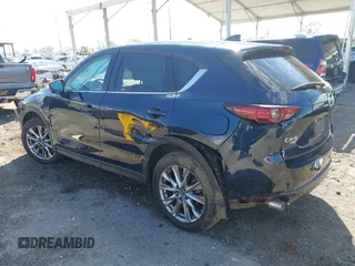 2020 Mazda CX-5 Grand Touring with VIN JM3KFBDM8L0807555, listed as a IAAI auction lot 41612906 with 40,518 mi miles. Bid and sale history available at carsss.com. Image 3.