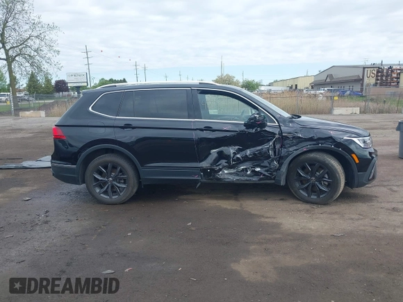 2024 Volkswagen Tiguan SE with VIN 3VVMB7AX7RM042855, listed as a IAAI auction lot 42223748 with 14,077 mi miles and . Bid and sale history available at DreamBid. Image 13.
