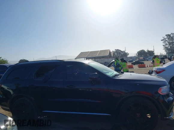 2015 Dodge Durango Limited with VIN 1C4RDHDG0FC200823, listed as a IAAI auction lot 42262387 with 127,442 mi miles and . Bid and sale history available at DreamBid. Image 13.