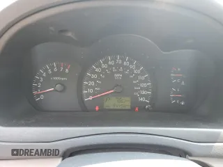 2005 Kia Spectra z VIN KNAFE162755170129, wystawiony jako Copart lot #60217065 z przebiegiem 94 458 mil mil oraz Szkoda całkowita • Salvage title. Historia ofert i sprzedaży dostępna na DreamBid. Obrazek 9.