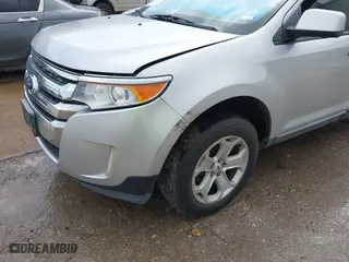 2011 Ford Edge SEL with VIN 2FMDK3JC5BBA25785, listed as a IAAI auction lot 42023501 with 192,844 mi miles. Bid and sale history available at carsss.com. Image 6.