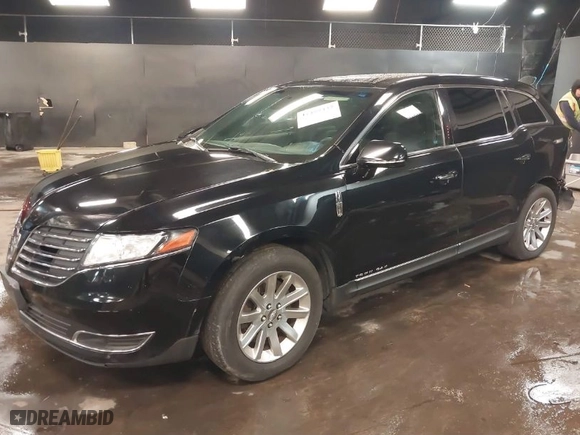2018 Lincoln MKT with VIN 2LMHJ5NK8JBL02014, listed as a IAAI auction lot 41489437 with 298,510 mi miles. Bid and sale history available at carsss.com. Image 2.