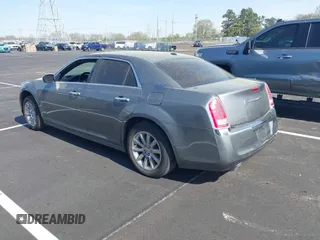 2012 Chrysler 300 Limited with VIN 2C3CCACG9CH199587, listed as a IAAI auction lot 41912142 with 158,065 mi miles. Bid and sale history available at carsss.com. Image 3.