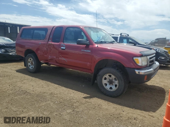 2000 Toyota Tacoma with VIN 4TAWN72N2YZ620655, listed as a Copart auction lot 60704065 with 257,636 mi miles and Salvage title. Bid and sale history available at DreamBid. Image 4.