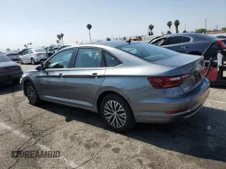 2019 Volkswagen Jetta SEL with VIN 3VWE57BU9KM101597, listed as a Copart auction lot 60262205 with 82,685 mi miles and Salvage title. Bid and sale history available at DreamBid. Image 2.