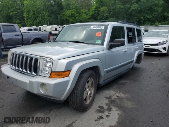 2009 Jeep Commander Sport z VIN 1J8HG48K29C531877, wystawiony jako Copart lot #58708825 z przebiegiem 198 585 mil mil oraz Szkoda całkowita • Salvage title. Historia ofert i sprzedaży dostępna na DreamBid. Obrazek 1.