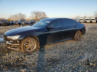 2016 BMW 7 Series 740i with VIN WBA7E2C59GG547530, listed as a Copart auction lot 88931785 with 113,822 mi miles and Salvage title. Bid and sale history available at DreamBid. Image 1.