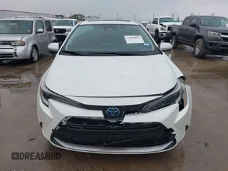 2024 Toyota Corolla Hybrid LE with VIN JTDBCMFE4RJ027221, listed as a IAAI auction lot 41084897 with 10,683 mi miles. Bid and sale history available at carsss.com. Image 12.