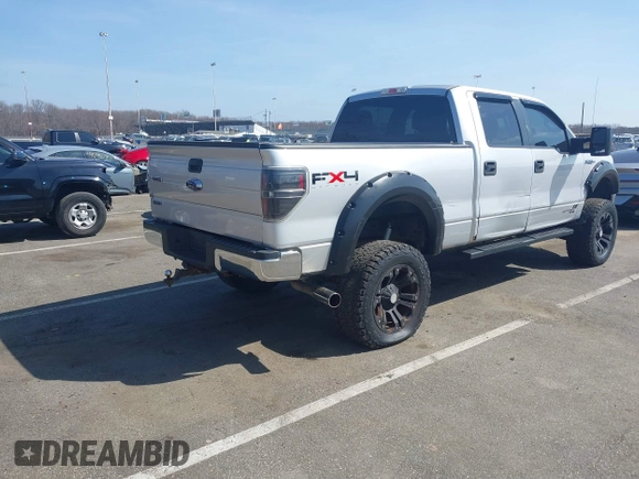 2014 Ford F-150 with VIN 1FTVW1EFXEKD65059, listed as a IAAI auction lot 41791605 with 146,190 mi miles and . Bid and sale history available at DreamBid. Image 4.