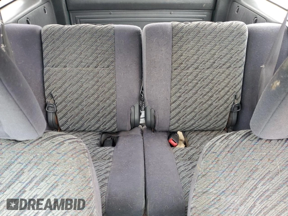 1999 Toyota RAV4 with VIN JT3GP10V2X0037464, listed as a Copart auction lot 54732085 with 306,550 mi miles and Clean Title. Bid and sale history available at DreamBid. Image 10.