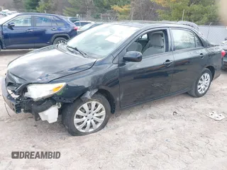 2012 Toyota Corolla L with VIN JTDBU4EE8C9180465, listed as a IAAI auction lot 41861829 with 163,631 mi miles. Bid and sale history available at carsss.com. Image 2.