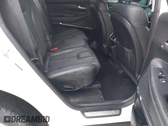 2019 Hyundai Santa Fe Ultimate with VIN 5NMS5CAA9KH012167, listed as a IAAI auction lot 41614279 with 100,925 mi miles and . Bid and sale history available at DreamBid. Image 8.