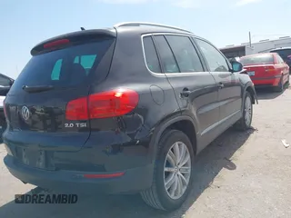 2012 Volkswagen Tiguan SE with VIN WVGAV7AX6CW521960, listed as a IAAI auction lot 42249355 with 118,496 mi miles and . Bid and sale history available at DreamBid. Image 4.