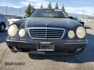 2001 Mercedes-Benz E-Class with VIN WDBJF65J21B365890, listed as a Copart auction lot 50519975 with 110,541 mi miles and Salvage Title. Bid and sale history available at carsss.com. Image 5.