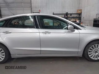 2013 Ford Fusion SE Hybrid with VIN 3FA6P0LU7DR228691, listed as a IAAI auction lot 42055540 with 144,389 mi miles and . Bid and sale history available at DreamBid. Image 13.