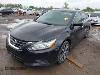 2016 Nissan Altima SR with VIN 1N4AL3AP2GC128229, listed as a IAAI auction lot 42317188 with 153,230 mi miles and . Bid and sale history available at DreamBid. Image 2.
