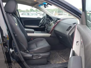 2015 Mazda CX-9 Grand Touring z VIN JM3TB2DA1F0456773, wystawiony jako IAAI lot #42257555 z przebiegiem 152 890 mil mil oraz . Historia ofert i sprzedaży dostępna na DreamBid. Obrazek 5.